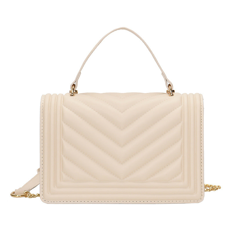 Fashion Simple Striped Shoulder Messenger Bag in a trendy design with a compact square shape, featuring a magnetic buckle and adjustable strap.