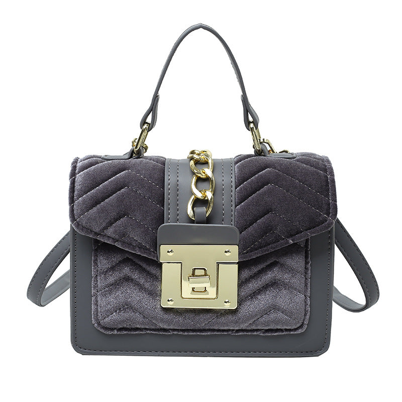 Fashion Velvet Lady's One-shoulder Small Messenger Bag in a stylish design, featuring a soft velvet texture and secure lock opening.