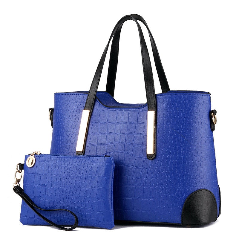 Female Fashion Two-Piece Color Contrast Handbag set featuring a large and small bag with stylish stitching details.