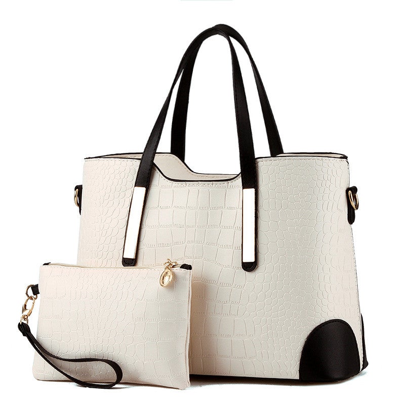 Female Fashion Two-Piece Color Contrast Handbag set featuring a large and small bag with stylish stitching details.