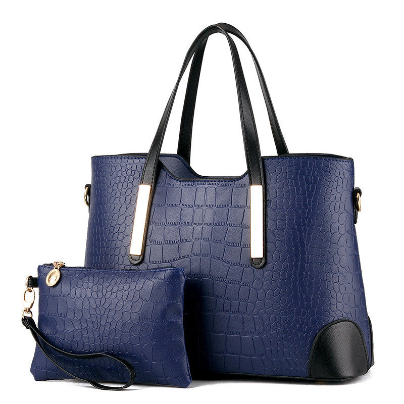 Female Fashion Two-Piece Color Contrast Handbag set featuring a large and small bag with stylish stitching details.