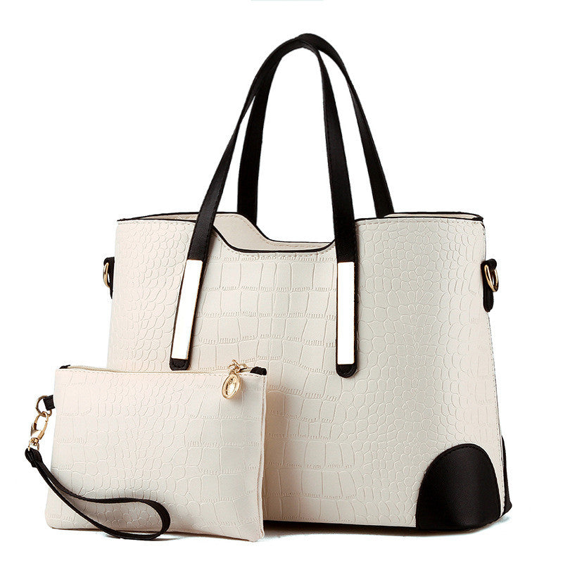 Female Fashion Two-Piece Color Contrast Handbag set featuring a large and small bag with stylish stitching details.