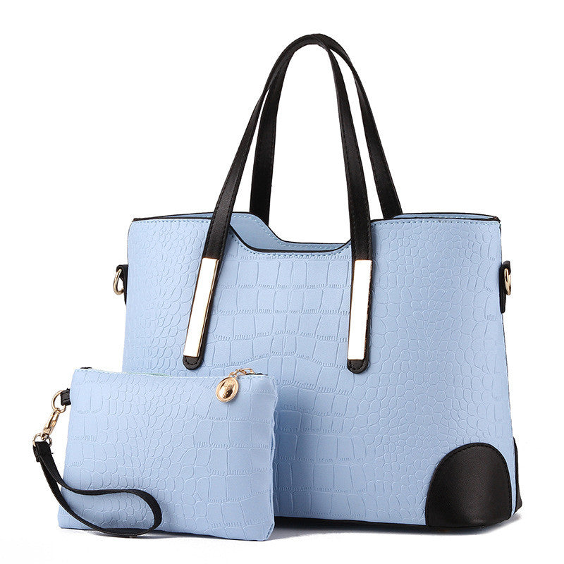 Female Fashion Two-Piece Color Contrast Handbag set featuring a large and small bag with stylish stitching details.