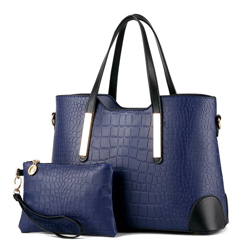 Female Fashion Two-Piece Color Contrast Handbag set featuring a large and small bag with stylish stitching details.