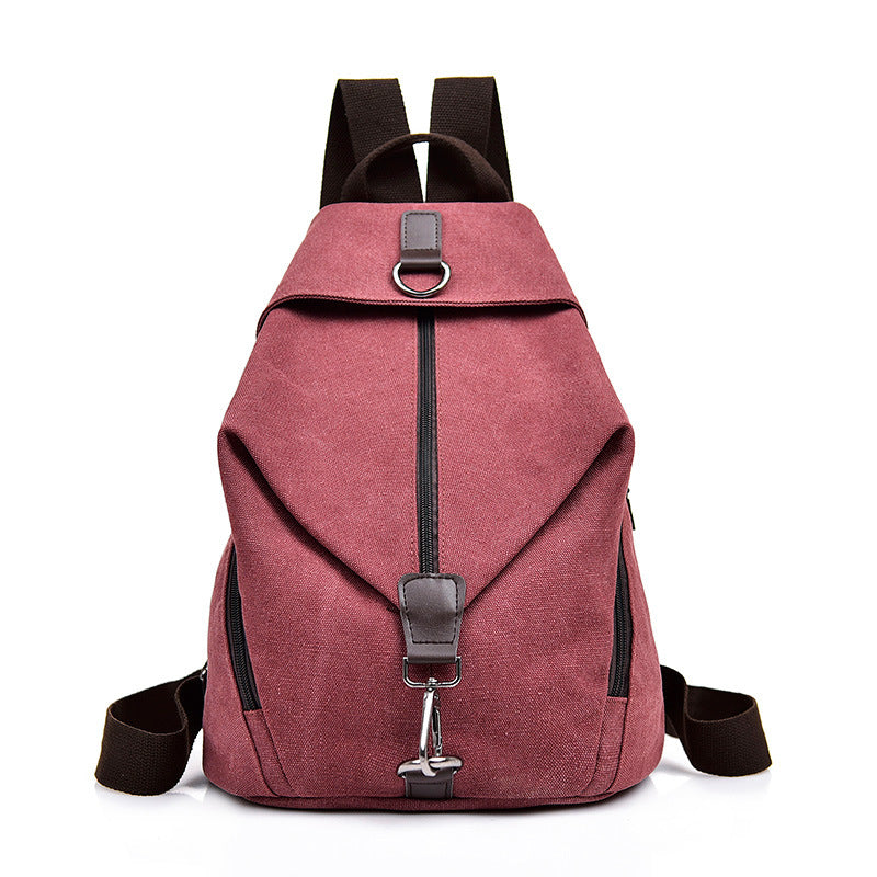 Female Korean Style Casual Travel Canvas Backpack in plain design, featuring a soft handle and spacious interior, perfect for stylish travel.