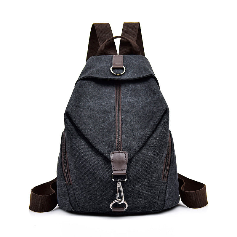 Female Korean Style Casual Travel Canvas Backpack in plain design, featuring a soft handle and spacious interior, perfect for stylish travel.