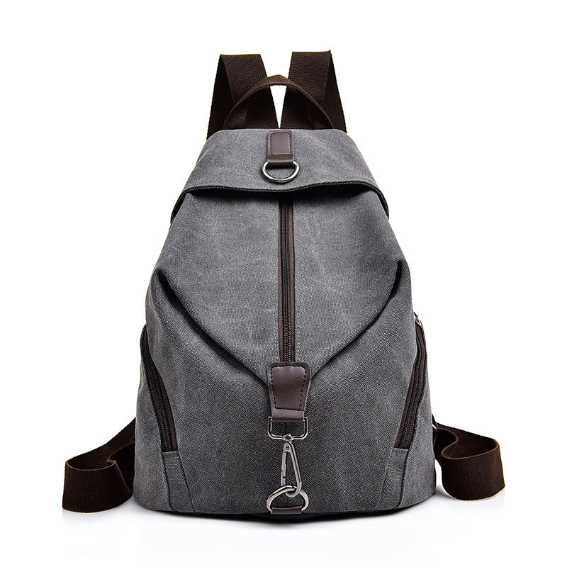 Female Korean Style Casual Travel Canvas Backpack in plain design, featuring a soft handle and spacious interior, perfect for stylish travel.