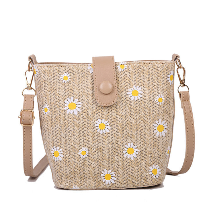 A stylish Female Popular Single Shoulder Straw Messenger Bucket Bag featuring a trendy bucket design and intricate weaving details.