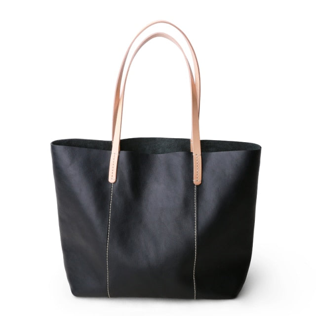 Genuine Leather Simple Tote in blue and green, showcasing its soft structure and zipper closure.