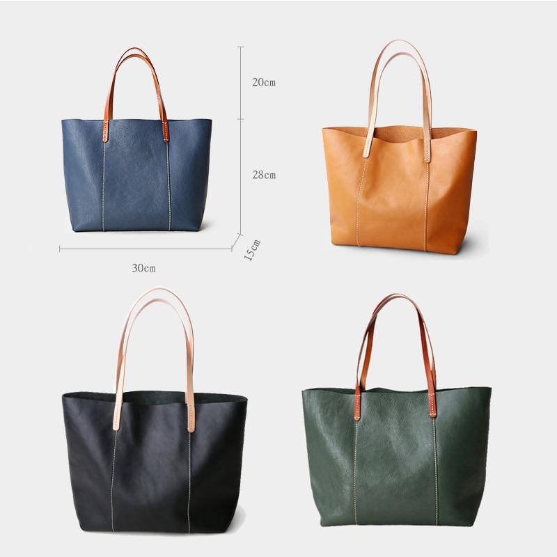 Genuine Leather Simple Tote in blue and green, showcasing its soft structure and zipper closure.