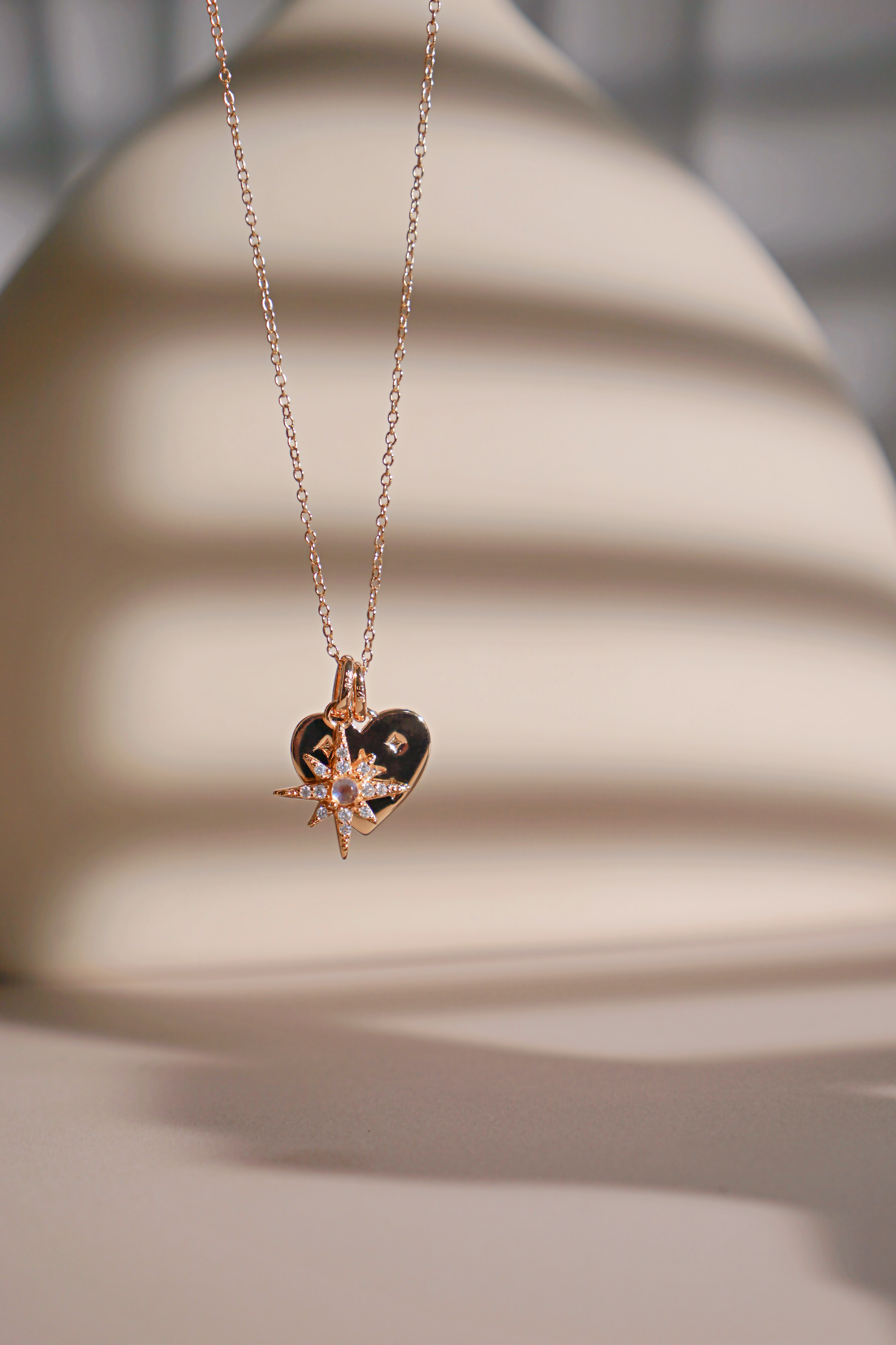 Gold North Star Charm pendant, symbolizing hope and guidance, elegantly designed with a shimmering finish.