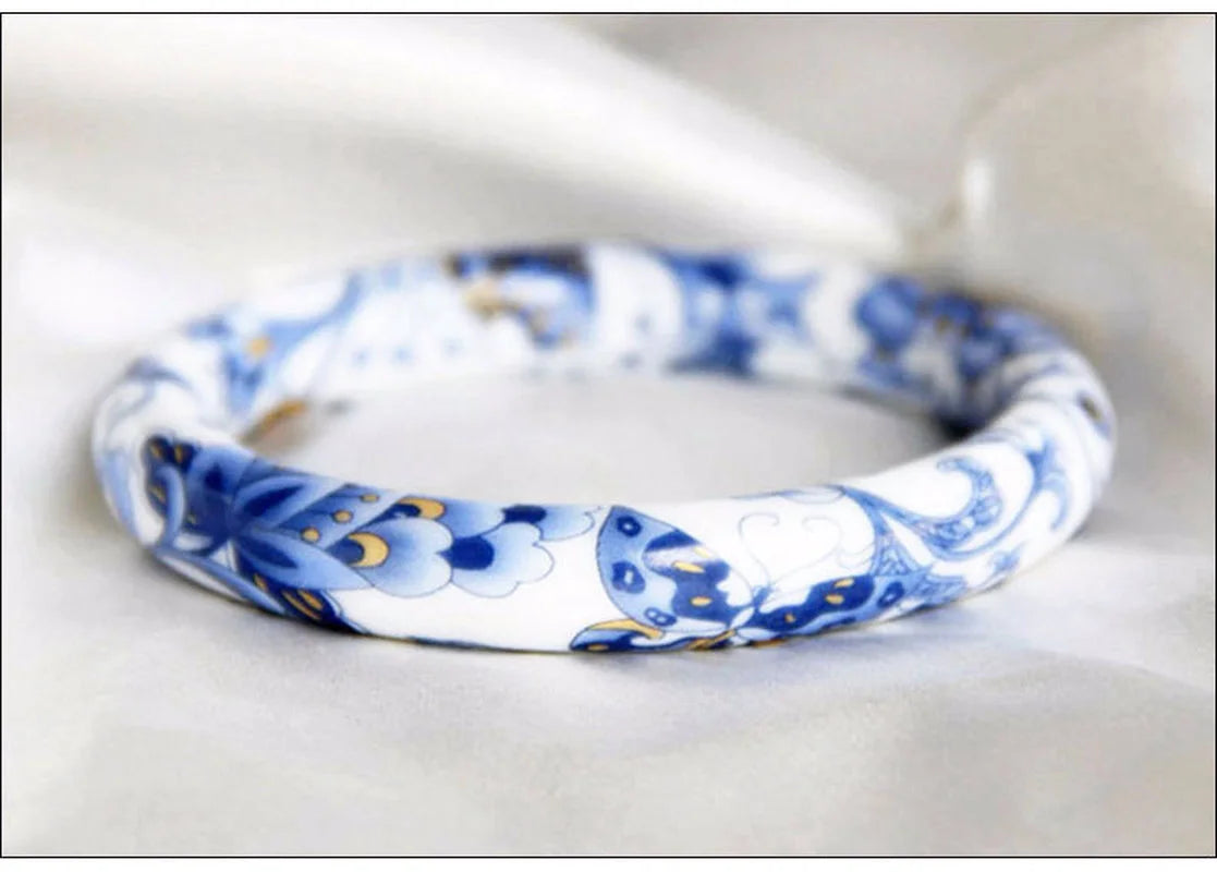 Gorgeous round blue and white porcelain bracelet showcasing a classic geometric design, perfect for women's fashion.