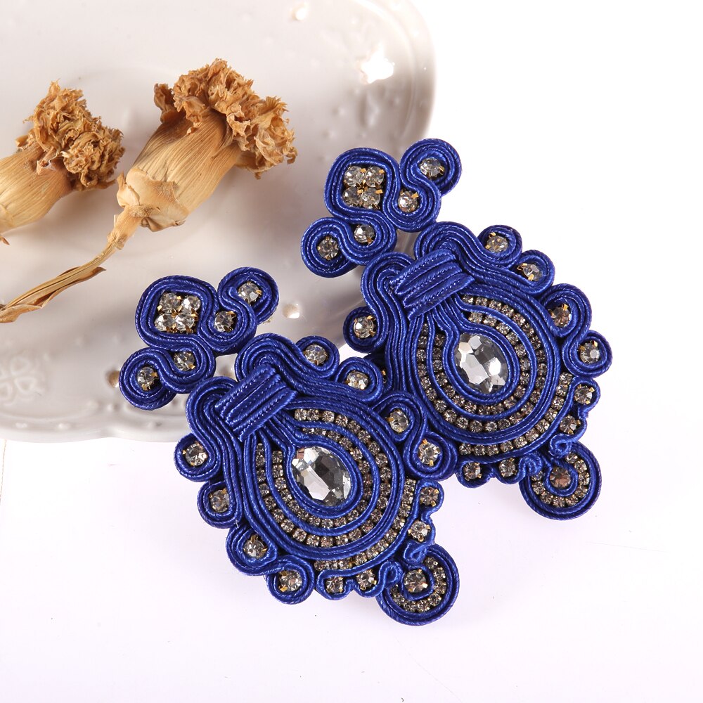 A pair of Handmade Soutache Drop Earrings featuring intricate leather design in blue, red, and brown colors, perfect for women.