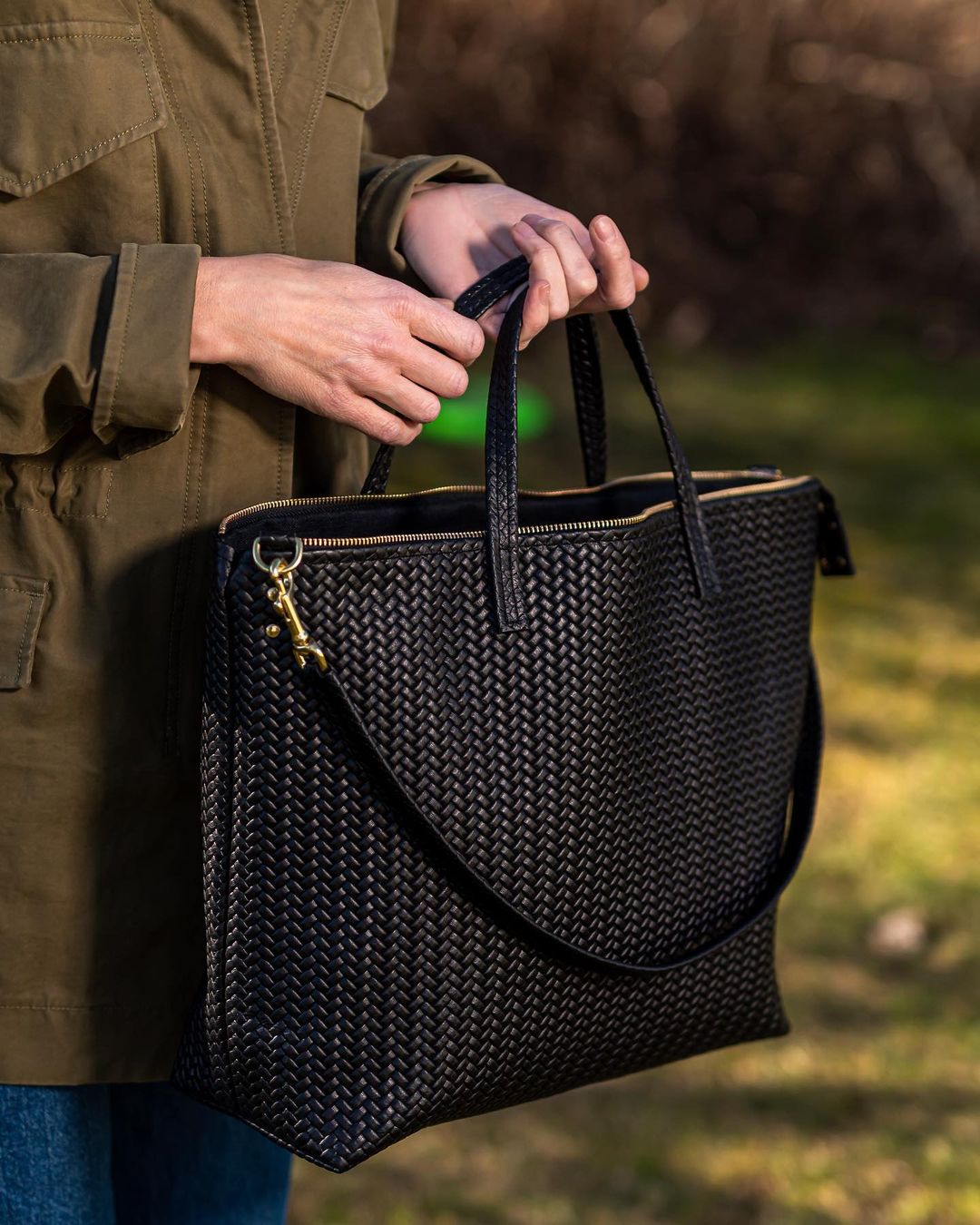Handmade Woven Original Leather Bag with Zipper, showcasing intricate weaving and a detachable shoulder strap.