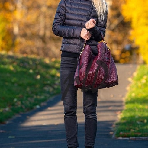 Handmade Woven Original Leather Bag in Burgundy, showcasing intricate weaving and a stylish design with a top handle and detachable shoulder strap.