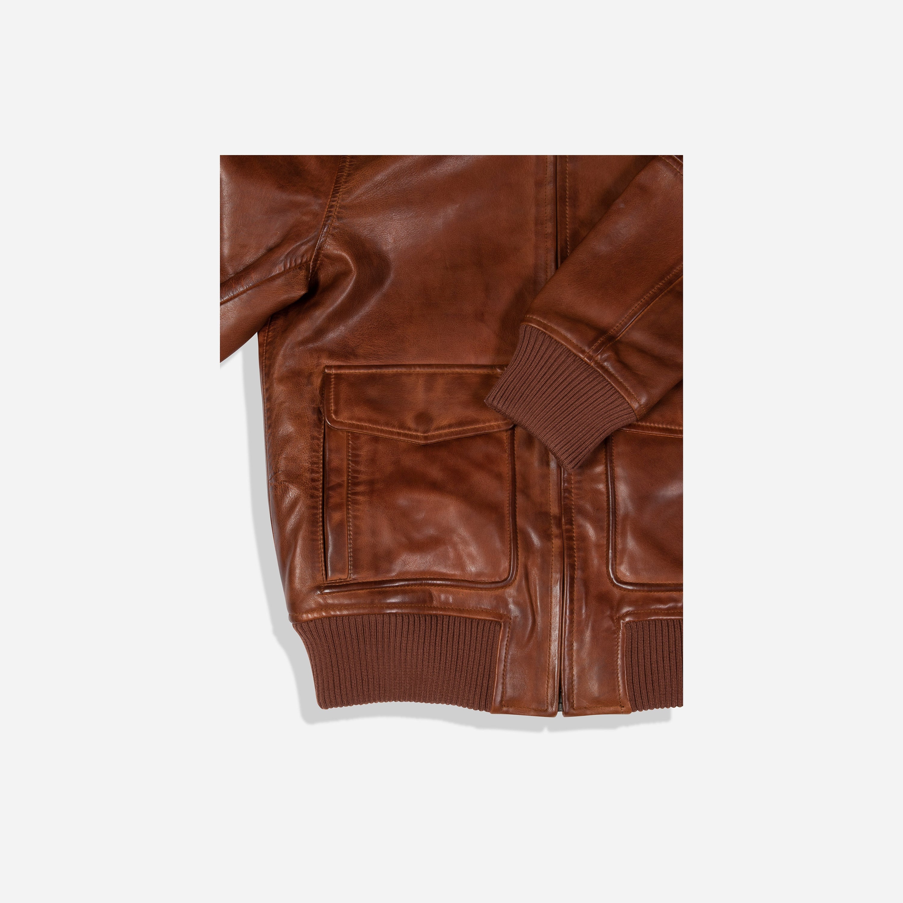 Harry Bomber Jacket in Cognac with detachable fur collar and stylish inner lining, perfect for warmth and fashion.