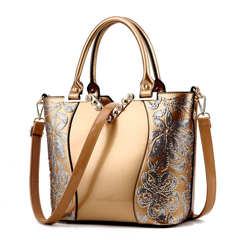 High Quality Embroidered PU Leather Handbag for Women featuring a bucket shape, elegant embroidery, and three adjustable shoulder straps.
