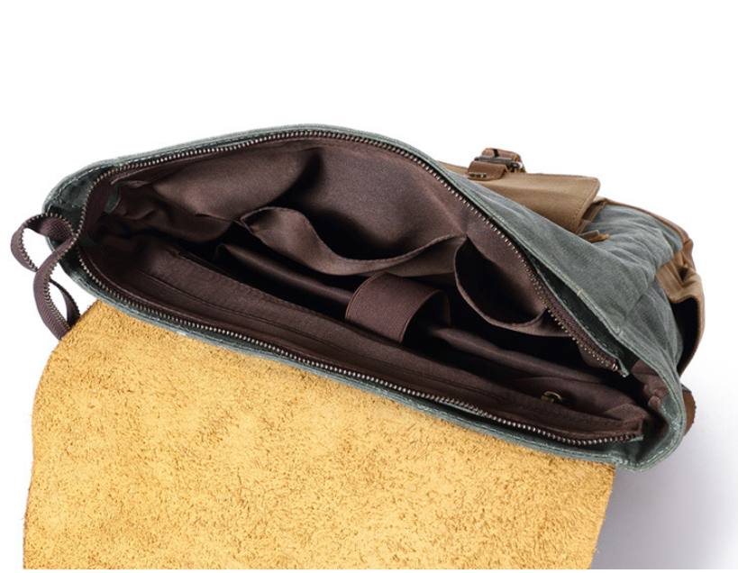 High Quality Fashion Canvas Backpack in vintage style, featuring multiple pockets and comfortable straps, suitable for men and women.