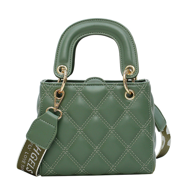 High Quality Fashion Solid Color Small Square Bag in solid color with diamond chain detail, showcasing its compact design and stylish appearance.