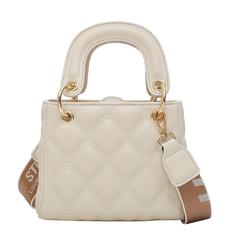 High Quality Fashion Solid Color Small Square Bag in solid color with diamond chain detail, showcasing its compact design and stylish appearance.