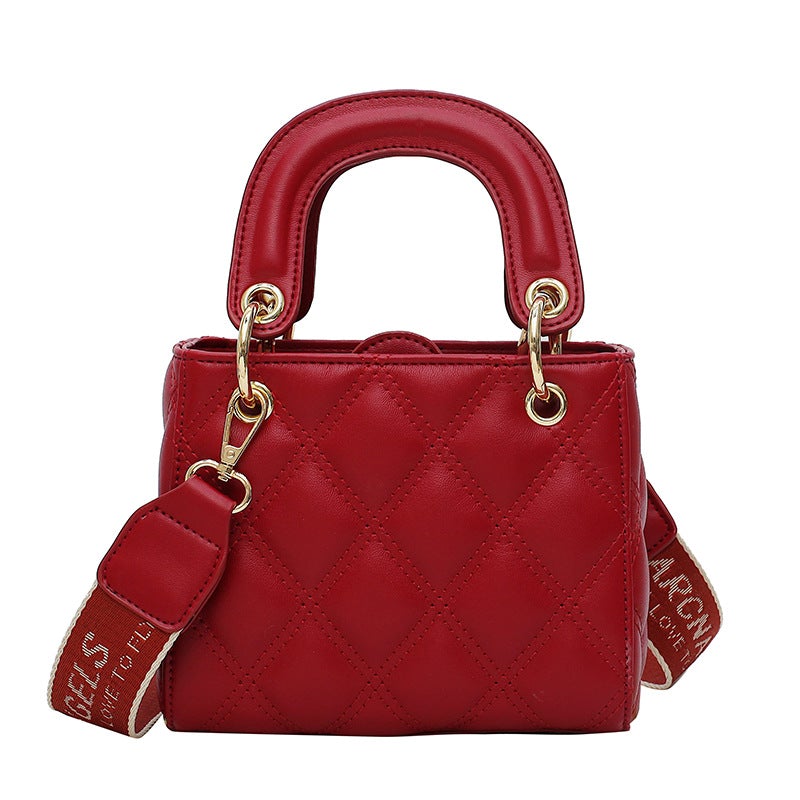 High Quality Fashion Solid Color Small Square Bag in solid color with diamond chain detail, showcasing its compact design and stylish appearance.