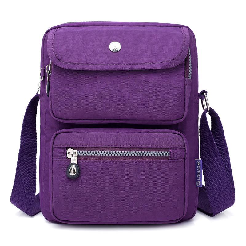 High Quality One Shoulder Slung Ladies Messenger Bag in vibrant candy colors, showcasing its stylish design and durable nylon fabric.