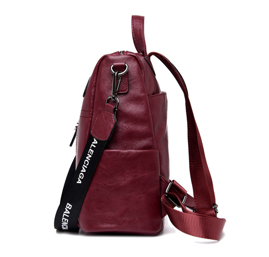 High Quality Solid Color Leather Backpack for Women, made from premium sheepskin with multiple pockets and a soft handle.