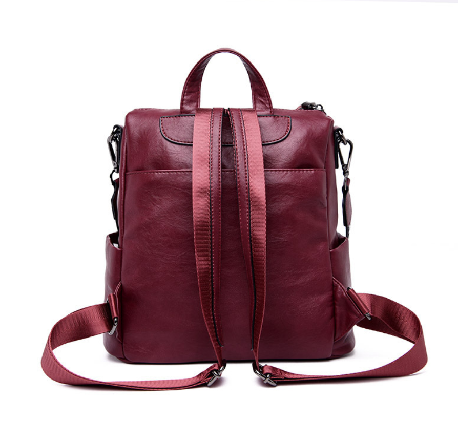 High Quality Solid Color Leather Backpack for Women, made from premium sheepskin with multiple pockets and a soft handle.