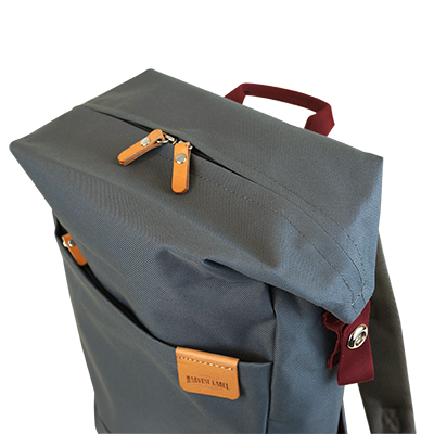 Highline Daypack in various colors with leather accents, showcasing its sleek design and multiple pockets.