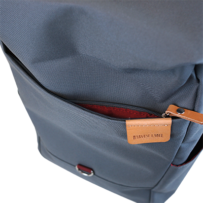 Highline Daypack in various colors with leather accents, showcasing its sleek design and multiple pockets.