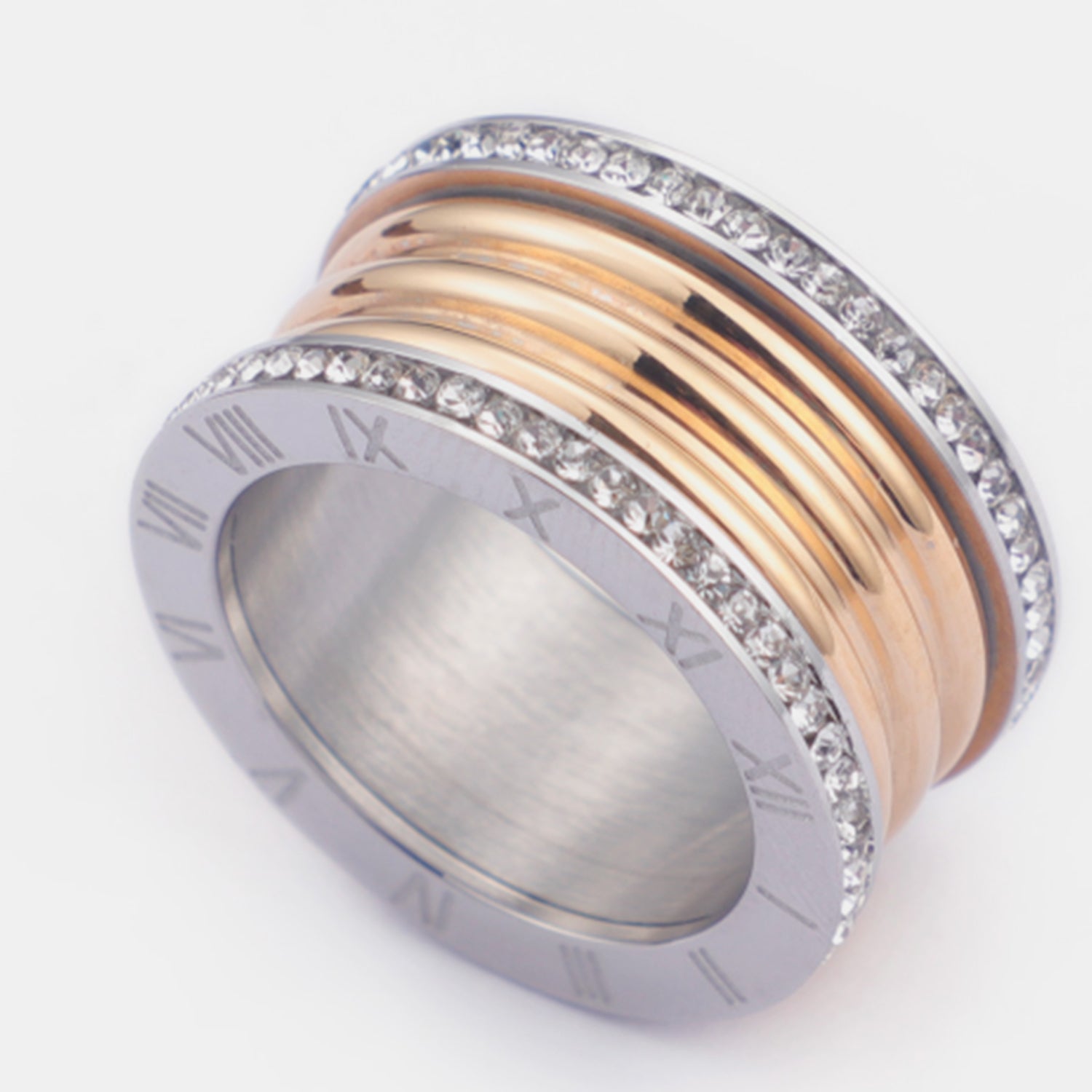 Inlaid Zircon Stainless Steel Ring showcasing its elegant design and sparkling zircon stones.