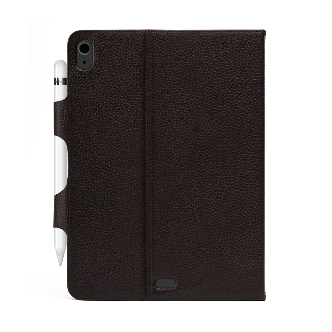 A stylish iPad leather case made from premium full grain leather, featuring a foldable design for multiple stand positions and a loop for Apple Pencil storage.