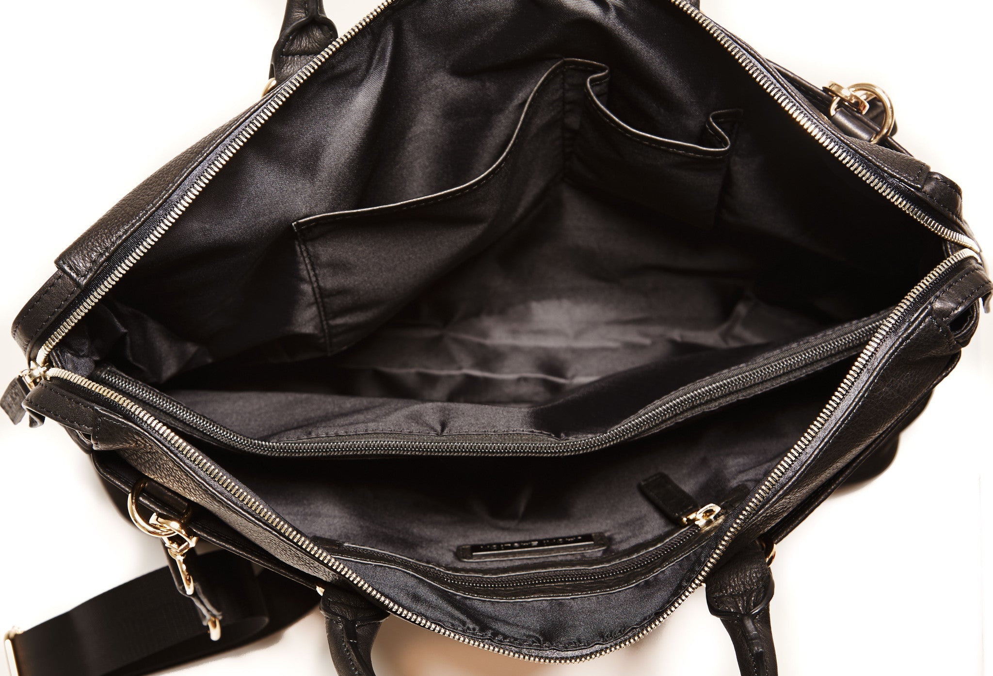 Jacki Easlick Black nylon briefcase featuring cowhide leather trim, waterproof material, and multiple pockets for organization.