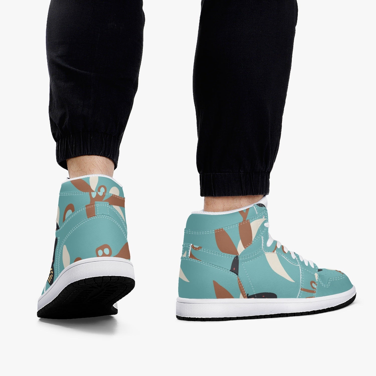 Jacki Easlick Butterfly High-Top Leather Sneakers showcasing a stylish butterfly design with a leather upper and padded insoles.
