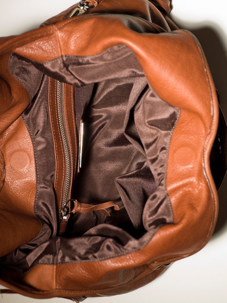 Jacki Easlick Cognac leather hobo bag showcasing its soft, slouchy design and high-quality craftsmanship.