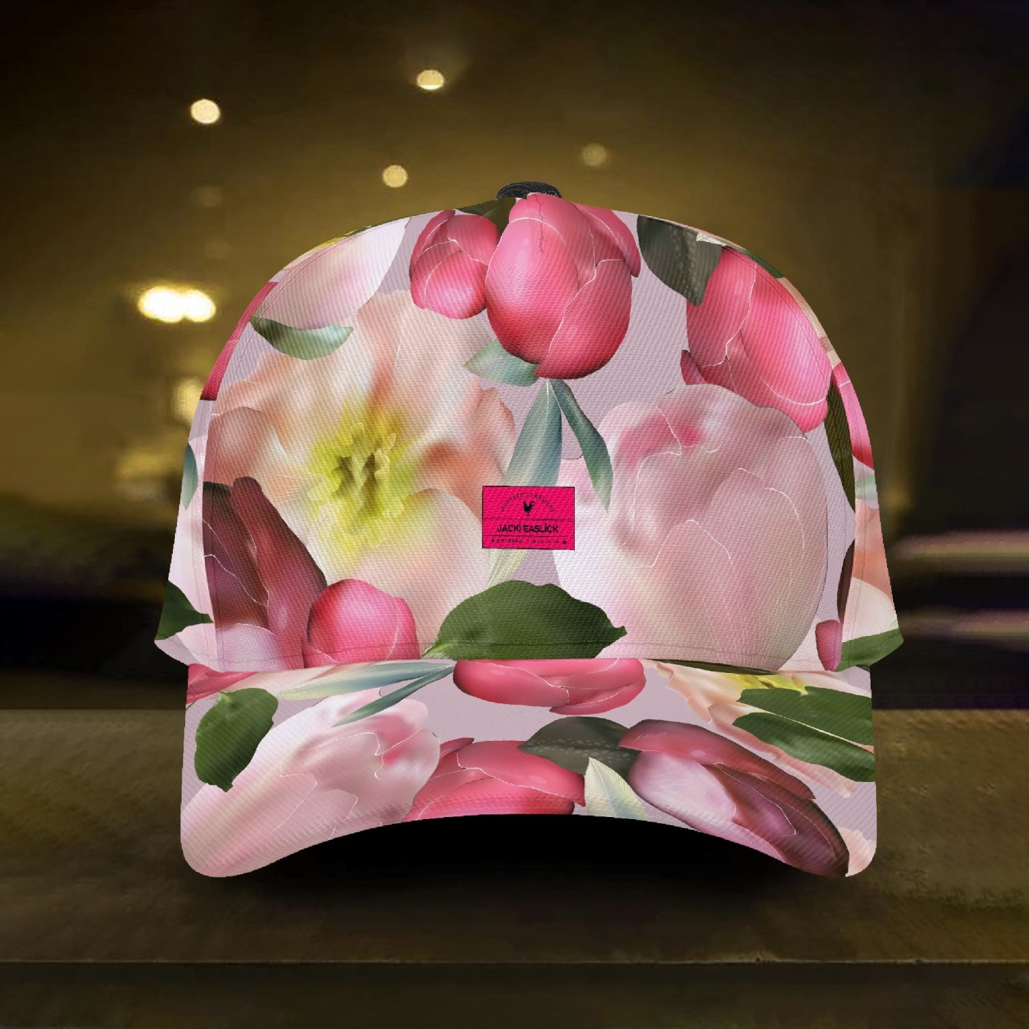 Jacki Easlick Floral Hat featuring a vibrant floral print, structured fit, and flat bill design, suitable for unisex wear.