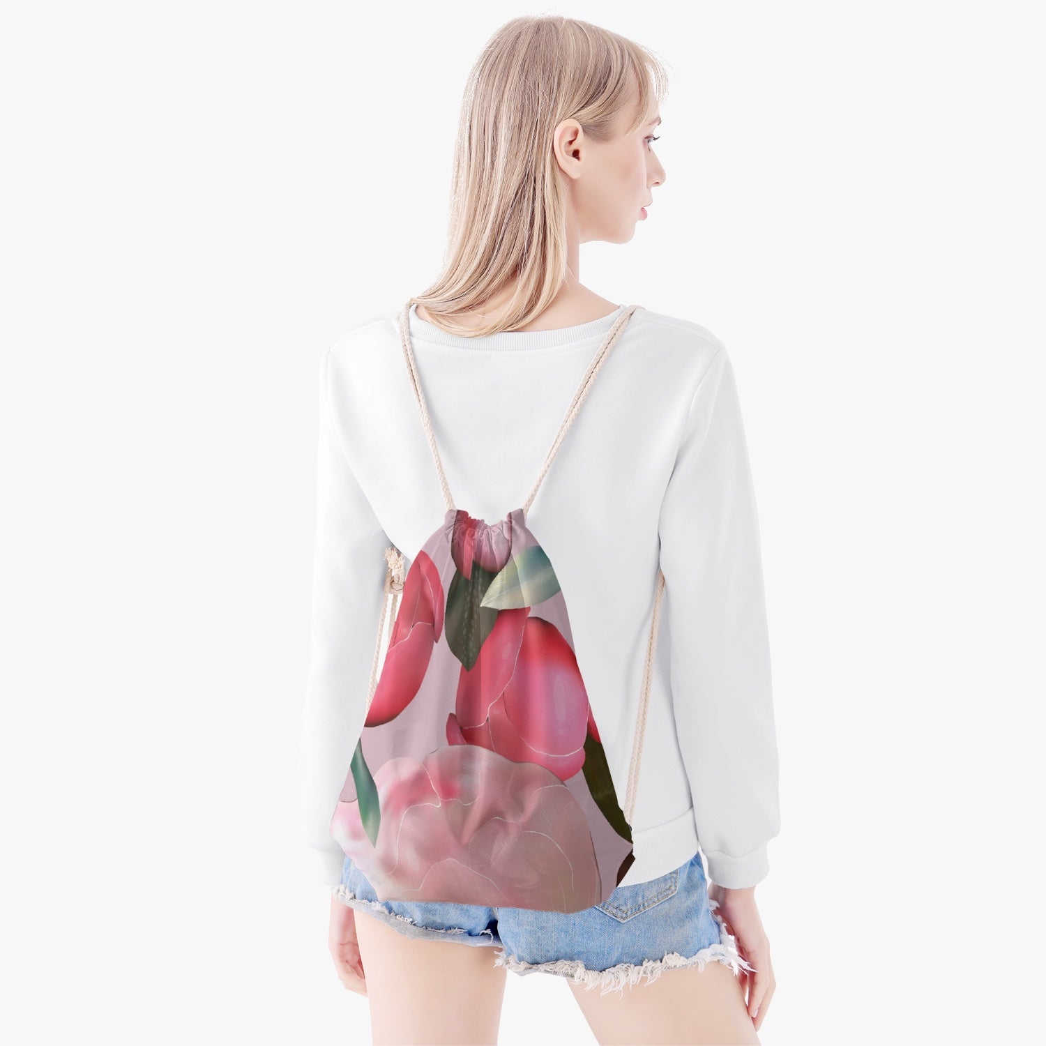 Jacki Easlick Garden Bloom Drawstring Backpack featuring a vibrant floral design, durable polyester fabric, and retractable linen straps.