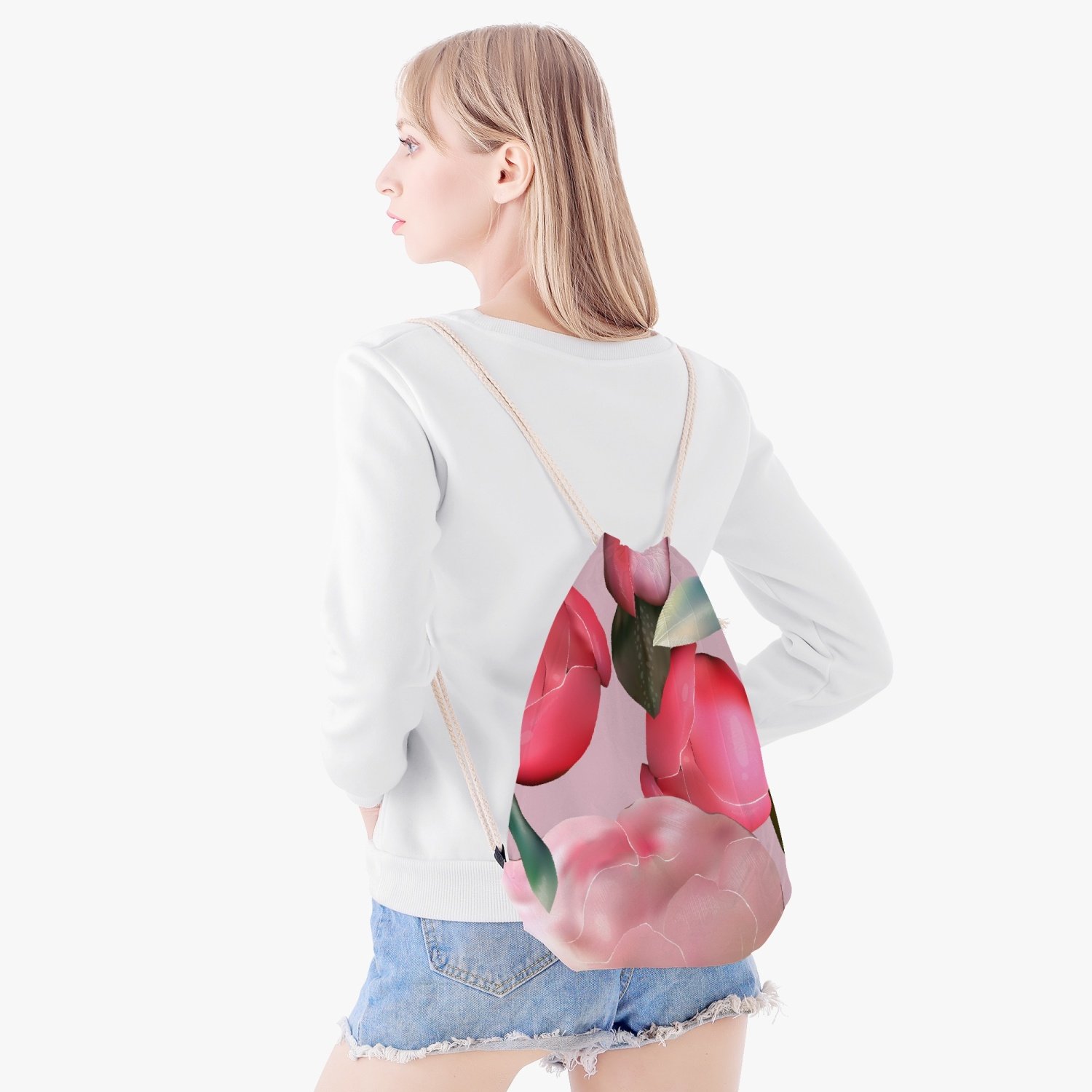 Jacki Easlick Garden Bloom Drawstring Backpack featuring a vibrant floral design, durable polyester fabric, and retractable linen straps.