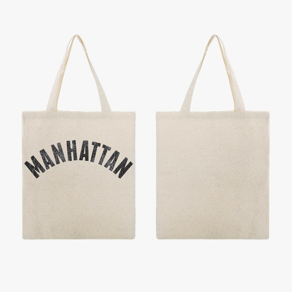 Jacki Easlick Manhattan Canvas Tote Bag featuring a stylish one-side print, made from durable canvas material, ideal for beach and daily use.