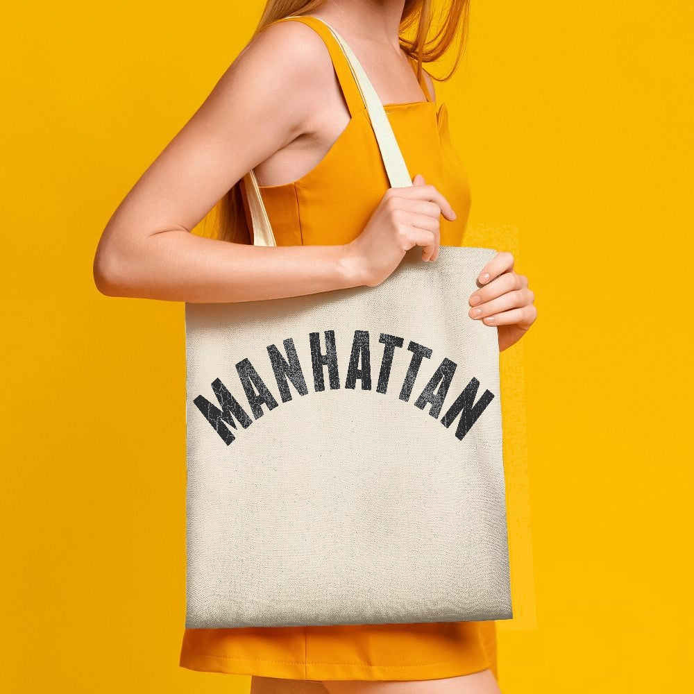 Jacki Easlick Manhattan Canvas Tote Bag featuring a stylish one-side print, made from durable canvas material, ideal for beach and daily use.