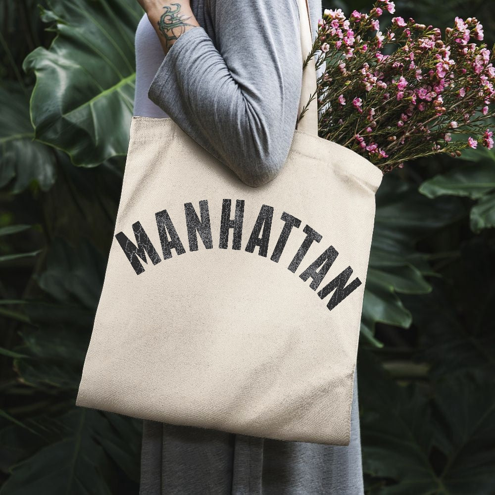 Jacki Easlick Manhattan Canvas Tote Bag featuring a stylish one-side print, made from durable canvas material, ideal for beach and daily use.
