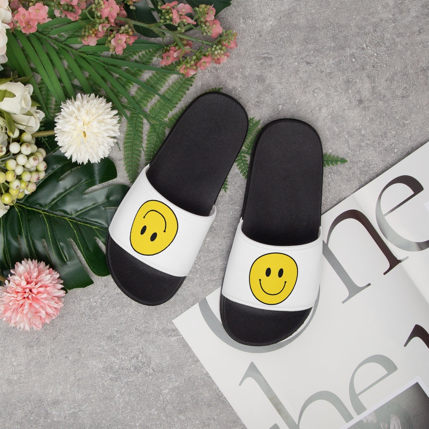 Jacki Easlick Smiley Face Slip on Beach Shoes in black, featuring a cheerful smiley face design and durable rubber soles.