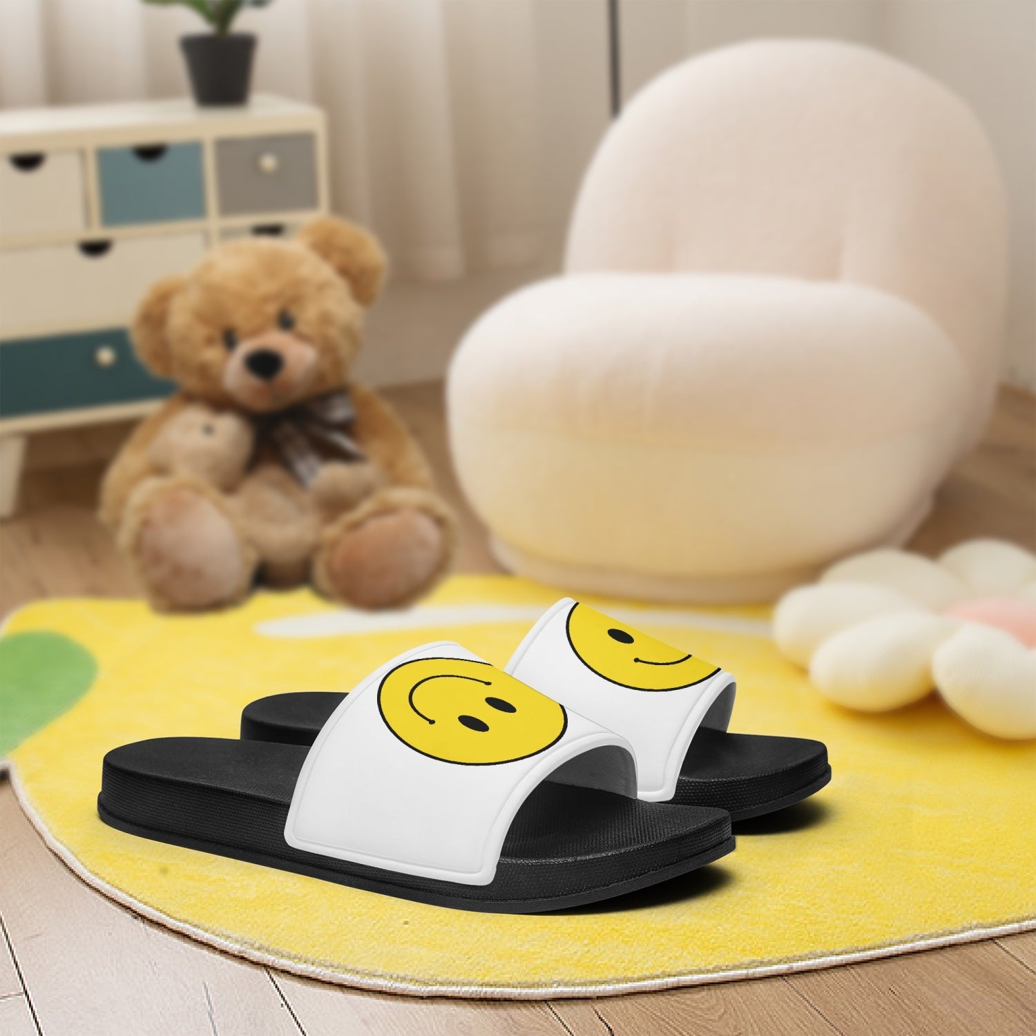 Jacki Easlick Smiley Face Slip on Beach Shoes in black, featuring a cheerful smiley face design and durable rubber soles.