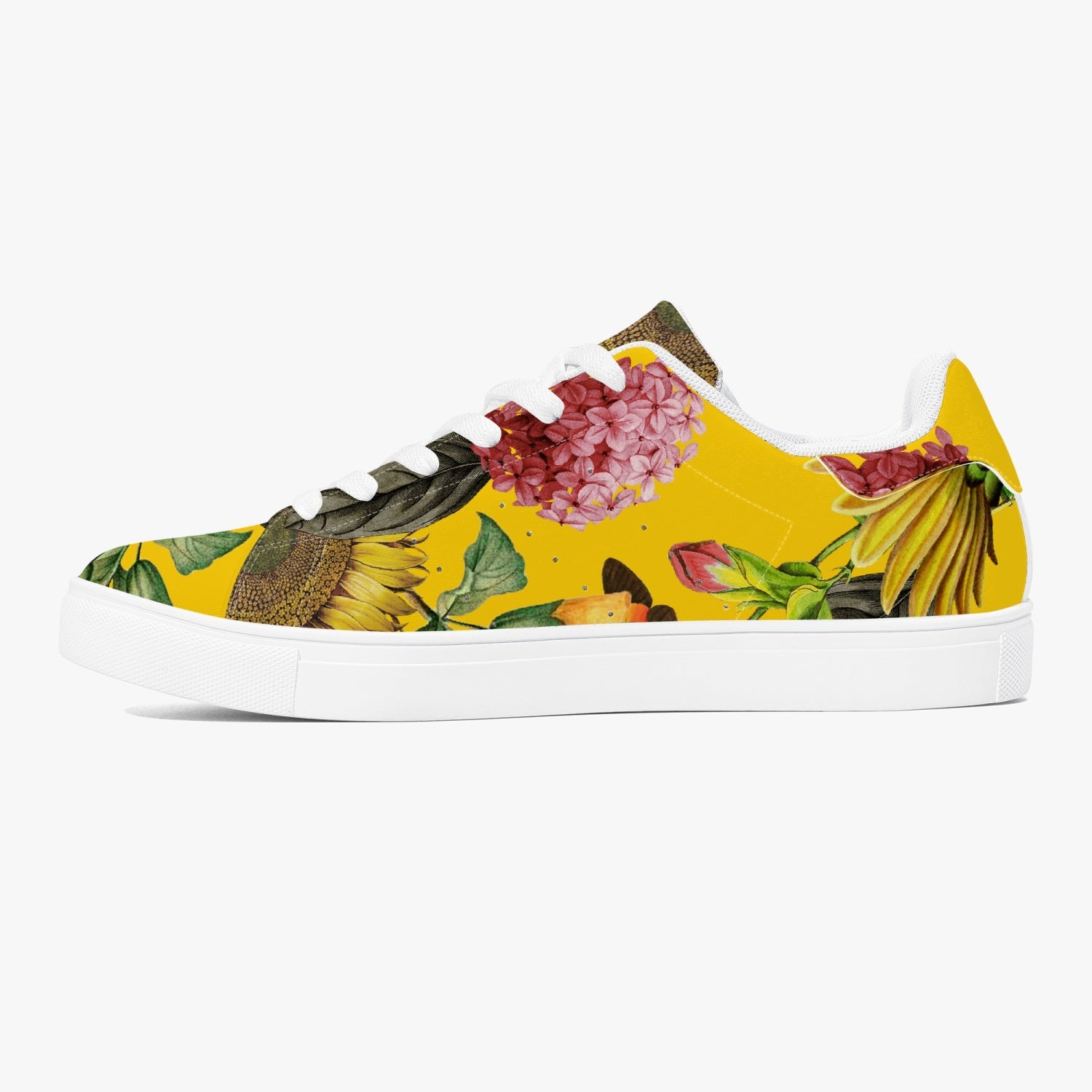 Jacki Easlick Sunflowers Low-Top Leather Sneakers in white and black with sunflower print design.