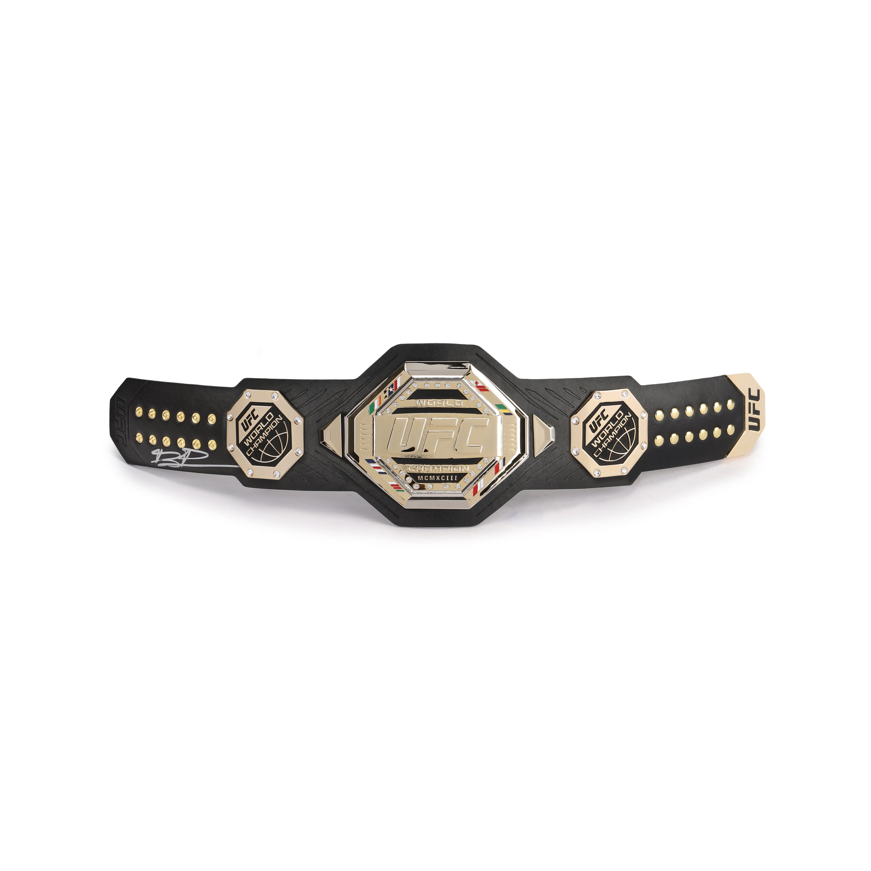 Jiří Procházka signed UFC legacy replica desktop belt displayed on a desk, showcasing its intricate design and signature.