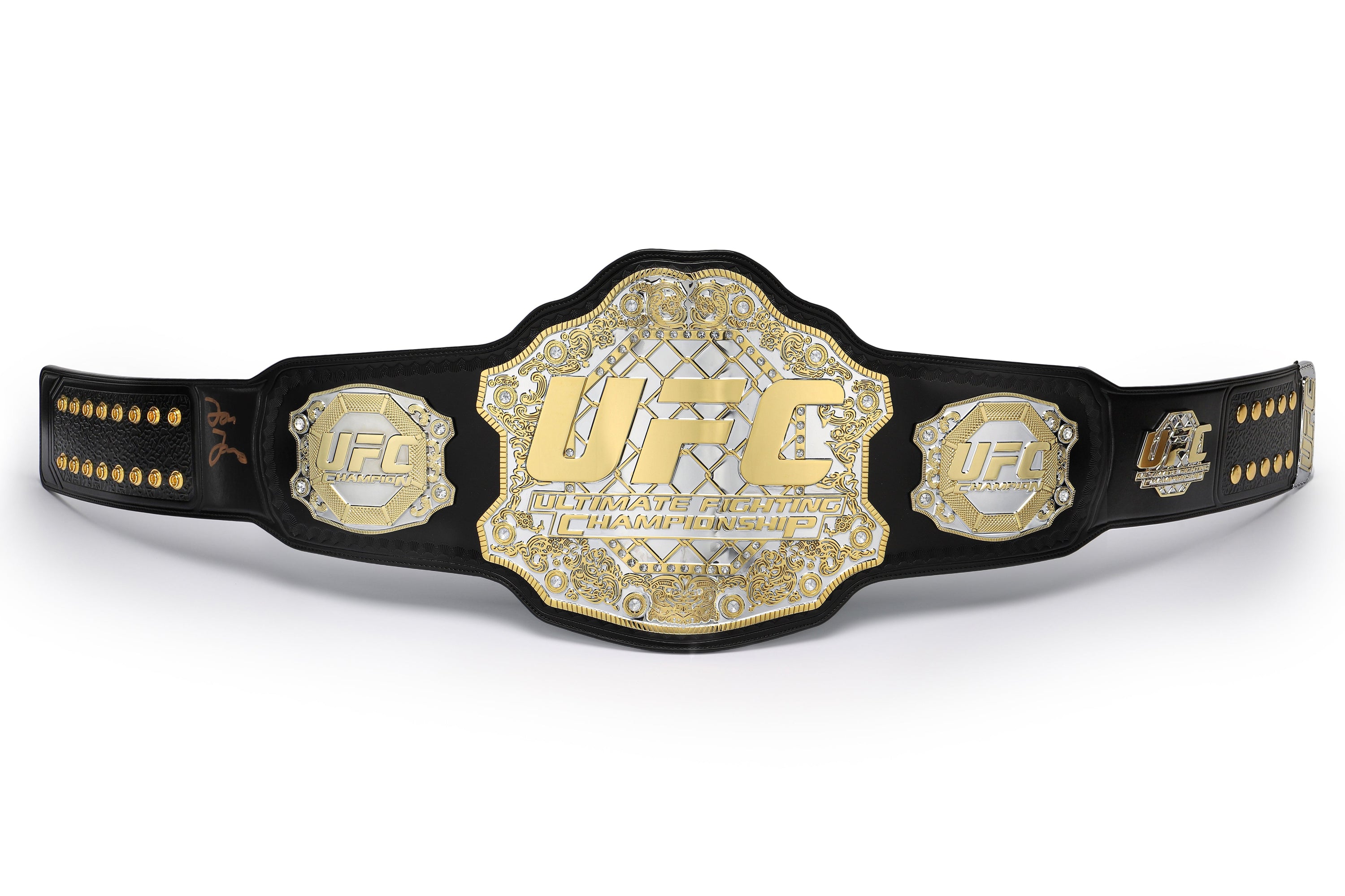 Jon Jones signed UFC classic championship replica belt, showcasing intricate details and authentic autograph.