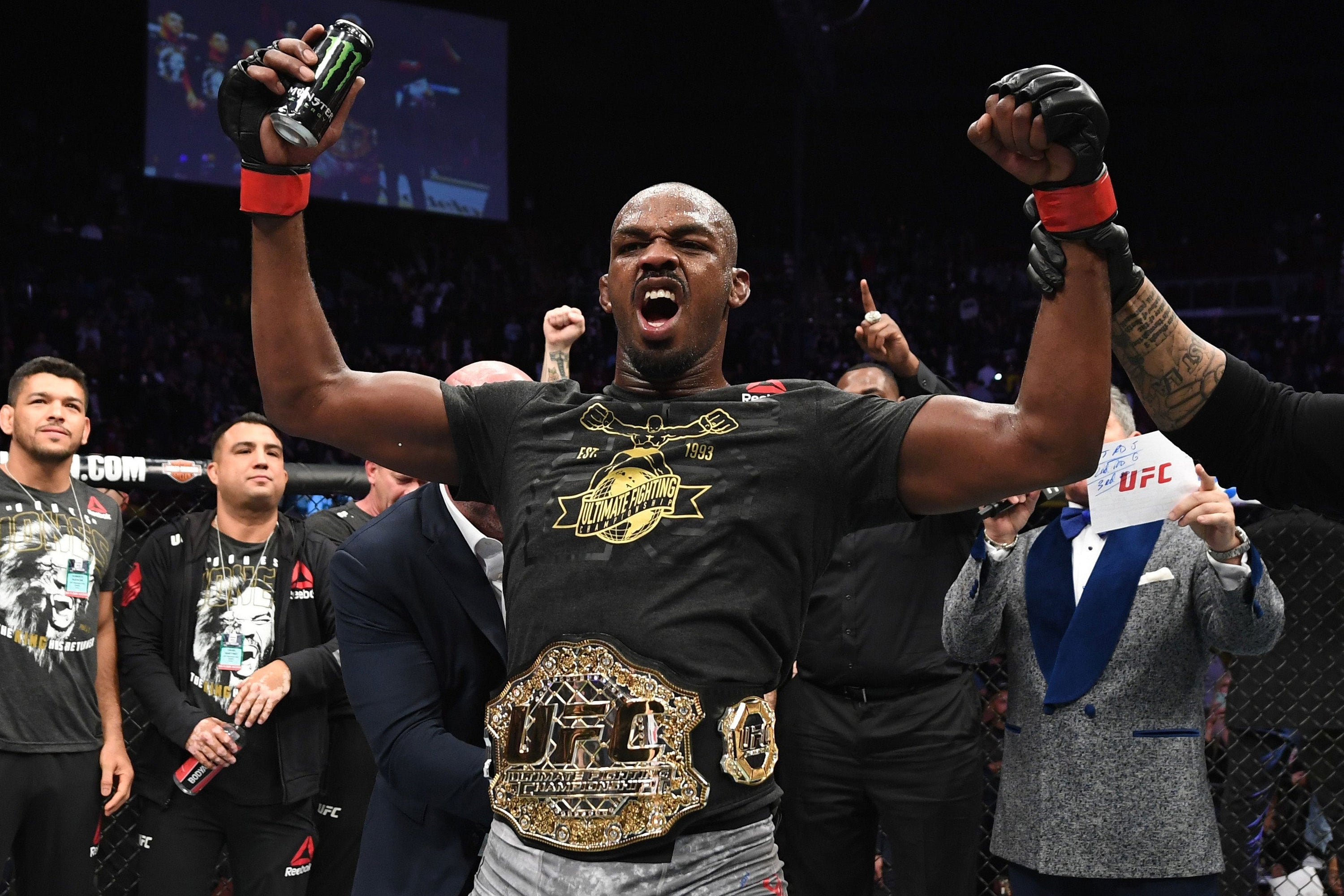 Jon Jones signed UFC classic championship replica belt, showcasing intricate details and authentic autograph.