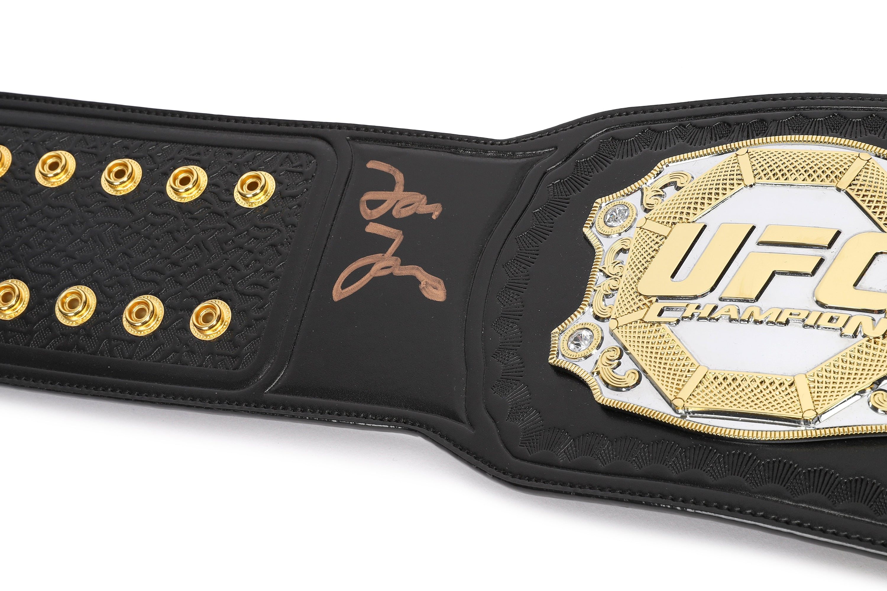 Jon Jones signed UFC classic championship replica belt, showcasing intricate details and authentic autograph.