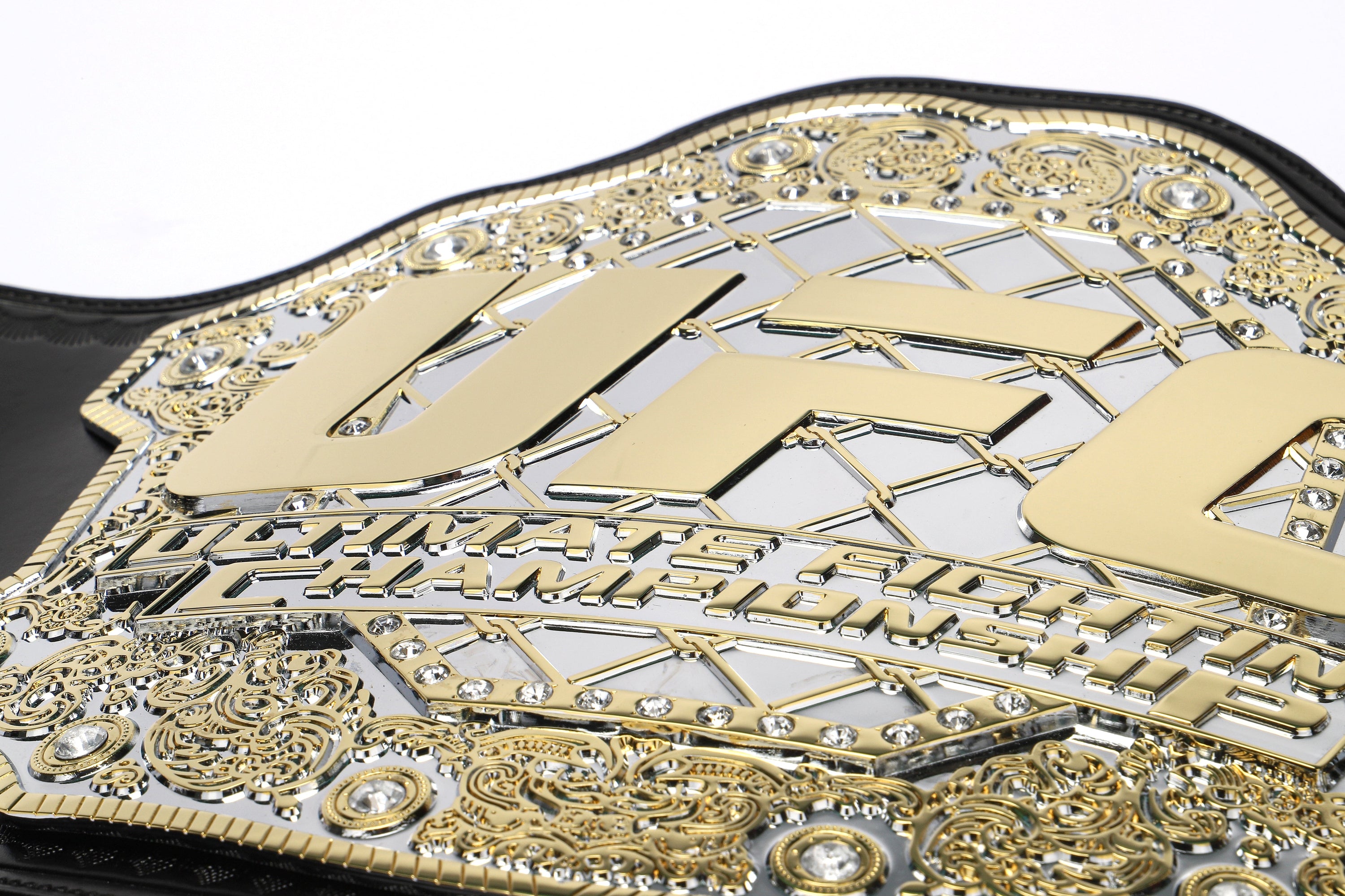 Jon Jones signed UFC classic championship replica belt, showcasing intricate details and authentic autograph.