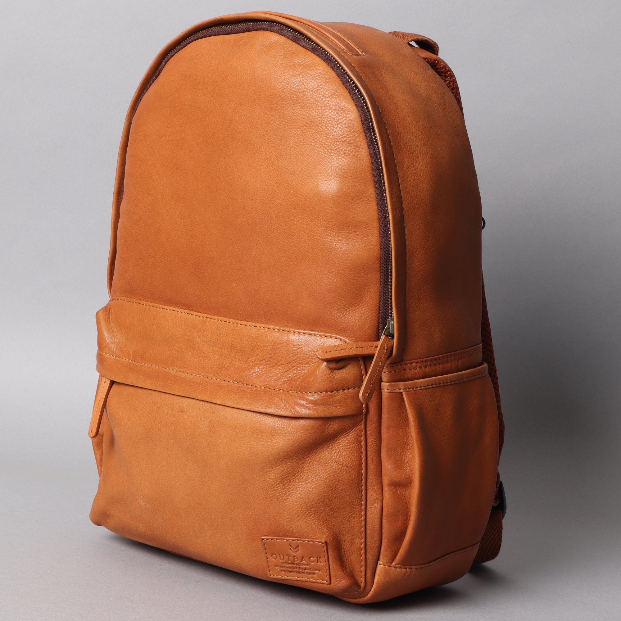 Journey Leather Backpack made from premium full grain leather with multiple pockets and padded laptop section, showcasing its stylish design and functionality.
